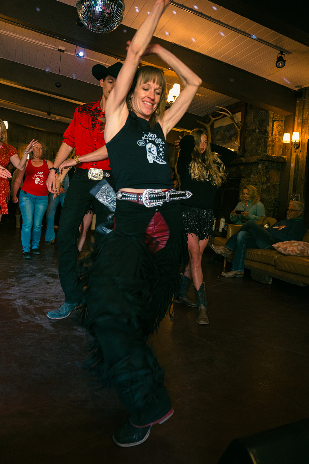 Swing dancers with a crowd around them